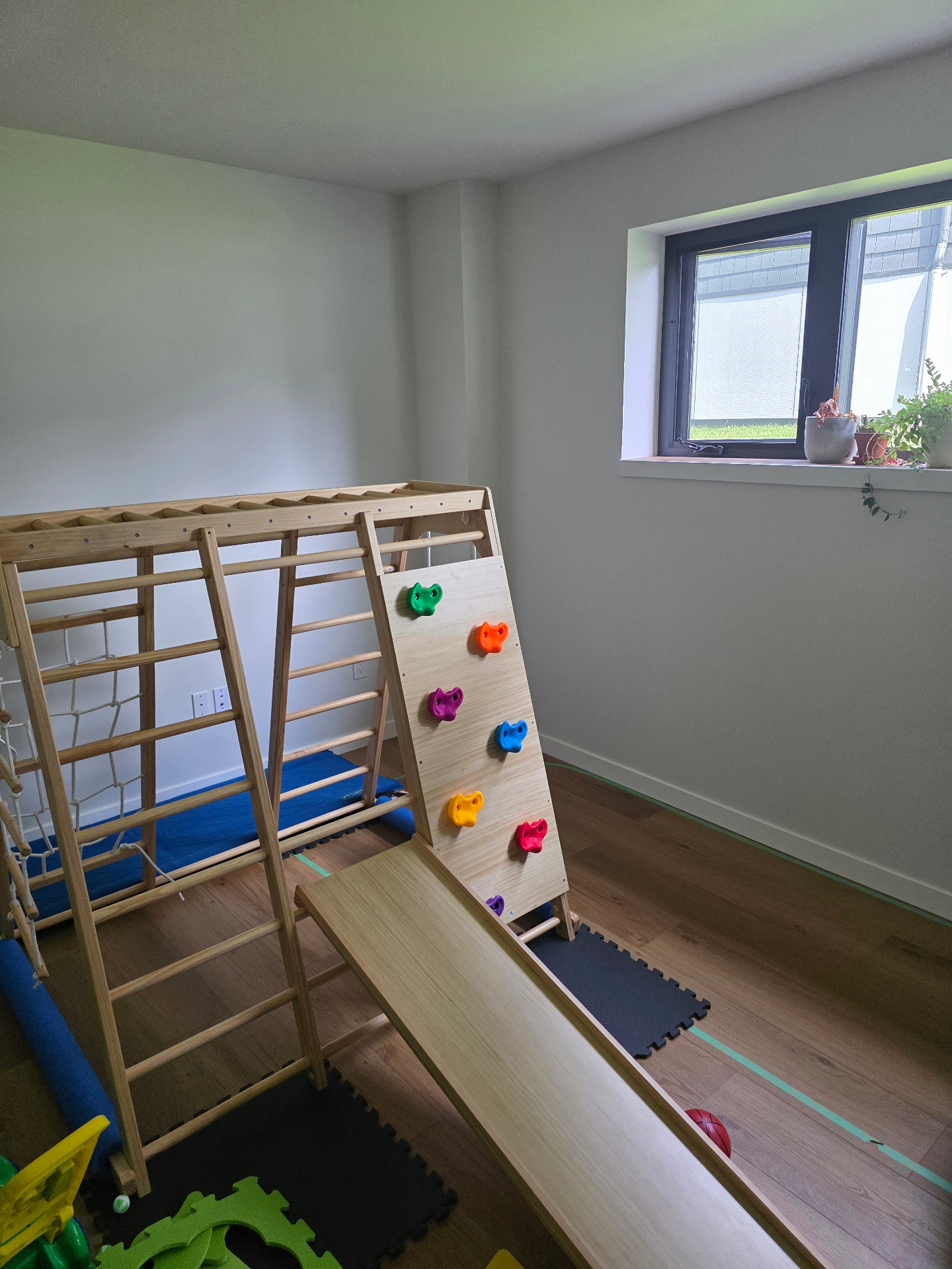 Kids playroom with window screen for fresh air